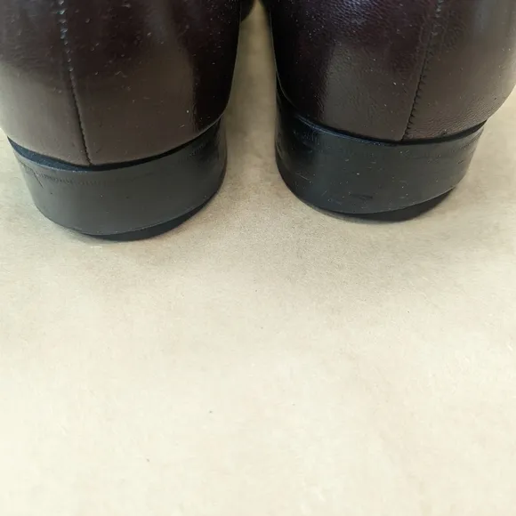Florsheim Shoes men's size 11 EEE  dress loafer brown leather. Woven rope accent